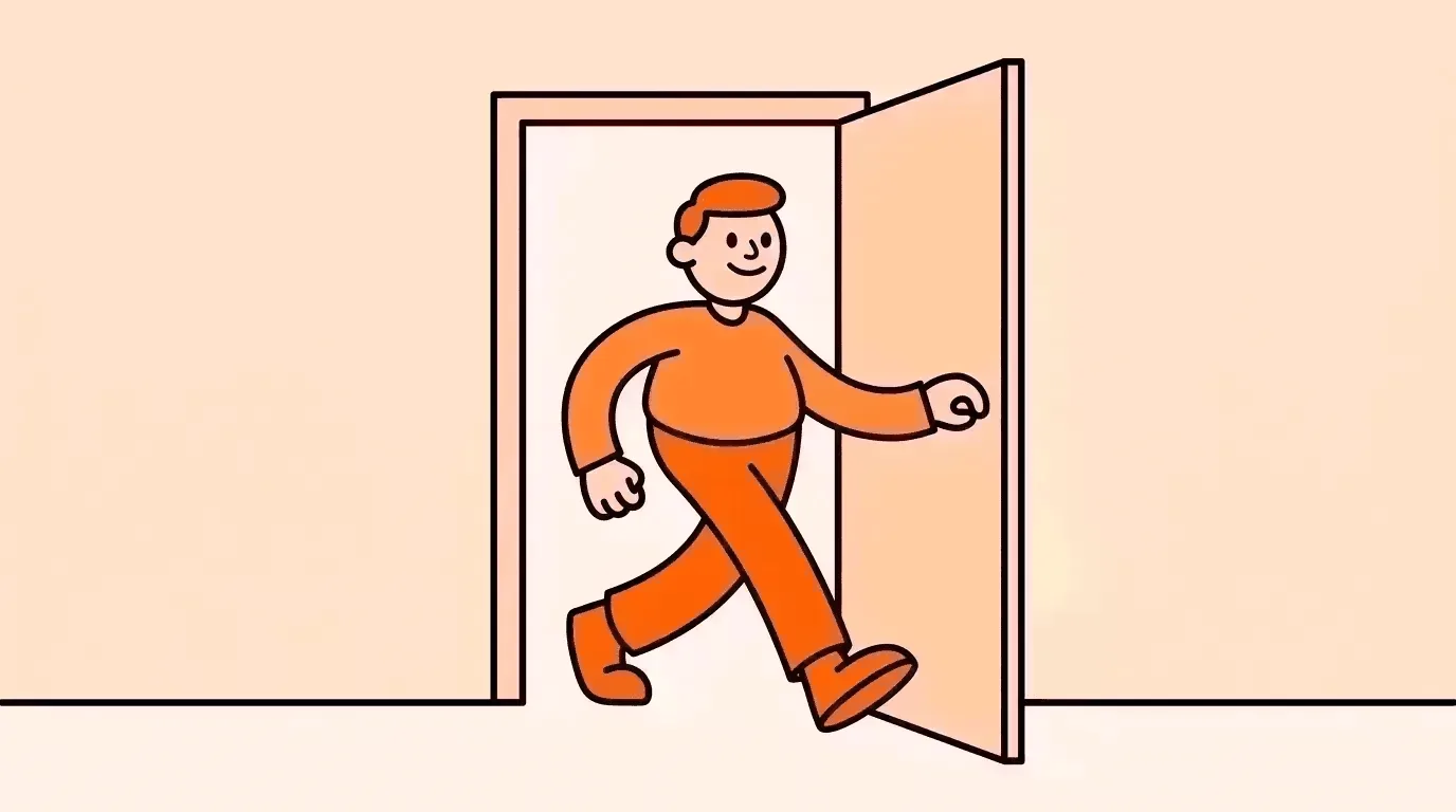 person walking through an open door