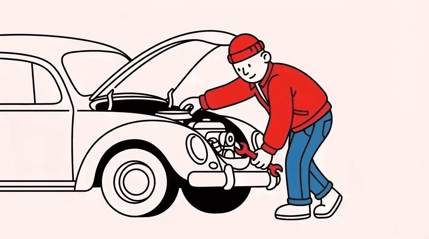 millennial working on a vintage car